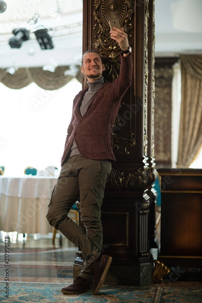 Fototapeta man standing in a room 