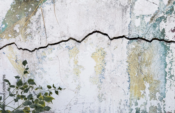 Fototapeta Crack on white old cement wall texture background, construction concept