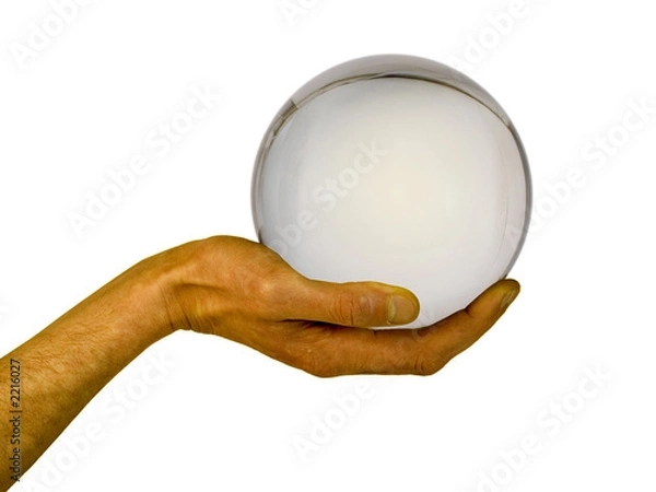 Fototapeta crystal sphere on a palm.