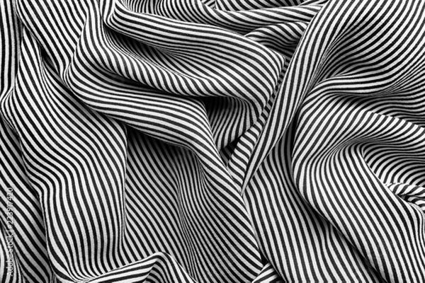 Fototapeta Silk fabric with black and white striped pattern