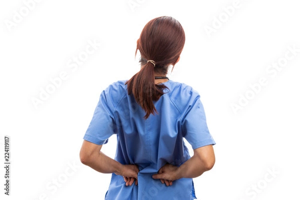 Fototapeta Rear view of female nurse or doctor holding painful lumbar area.