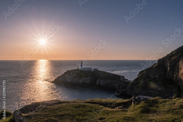 Fototapeta Sunset at south stack lighthouse on Anglesey in Wales