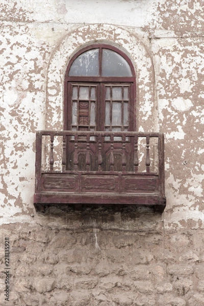 Fototapeta Close up of old window of a house facade in Cuzco Peru. Historical downtown