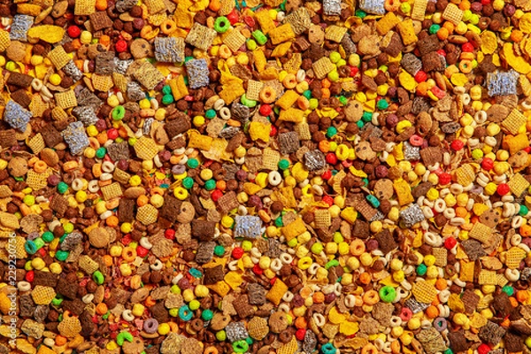 Fototapeta background of different cereals and cornflakes.  the concept of breakfast food. flat lay, top view