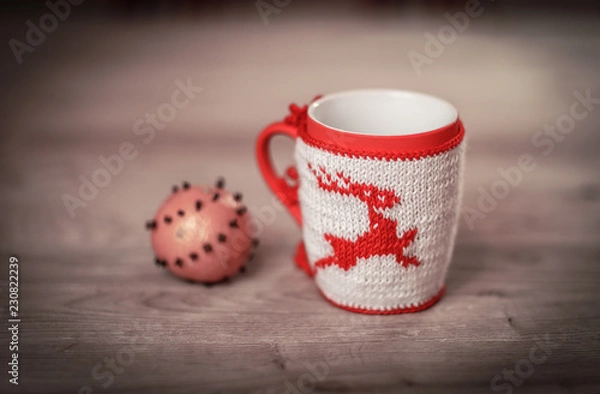 Fototapeta decorative Christmas Cup on wooden background. photo with copy space