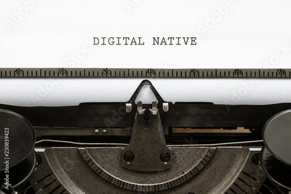 Fototapeta Digital Native written on vintage type writer from 1920s