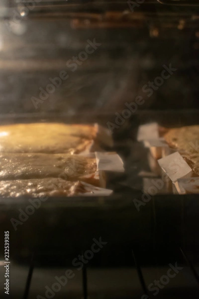 Fototapeta Sobaos pasiegos, traditional cantabrian dessert in oven