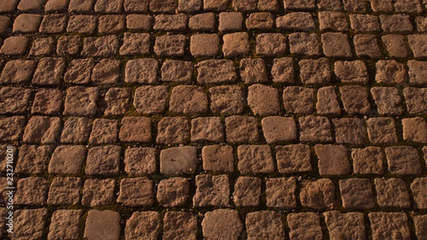 Fototapeta Street stone pavement texture. old cobblestone background