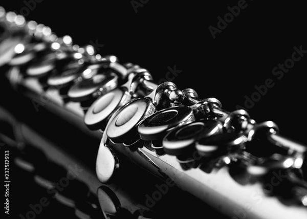 Fototapeta A flute on a black surface