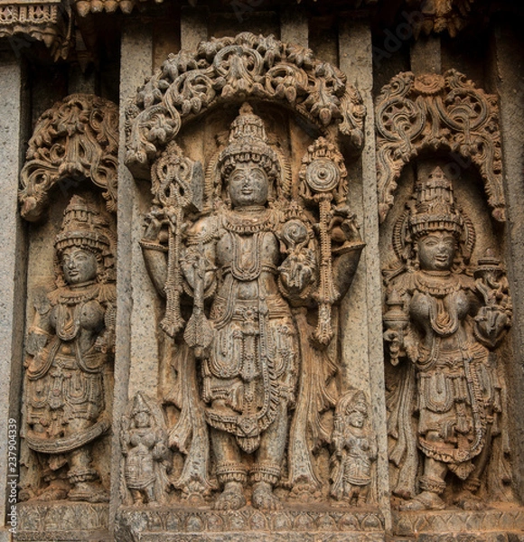 Fototapeta Artistic stone sculptures of Hindu Gods and Goddesses at Somanathapura Temple, Karnataka, India