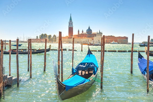 Fototapeta Gondola in front on basilica on grand canal in Venice, Italy