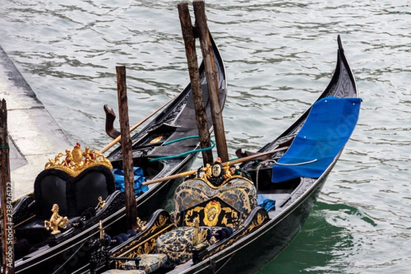 Fototapeta  Two Gondola moored in a channel of Venice i