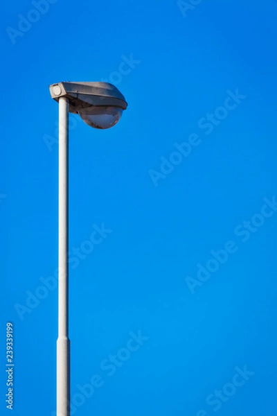 Fototapeta Street lamp blue sky vertical