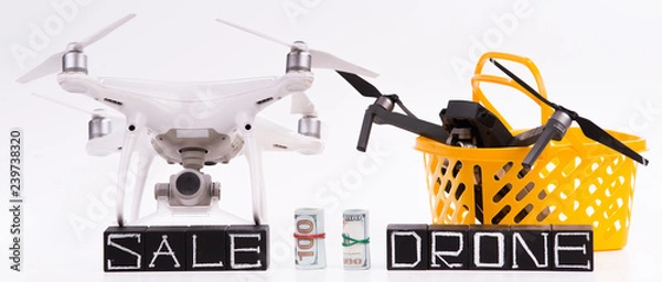 Fototapeta Flying drones on a white background with inscriptions "sale drone"