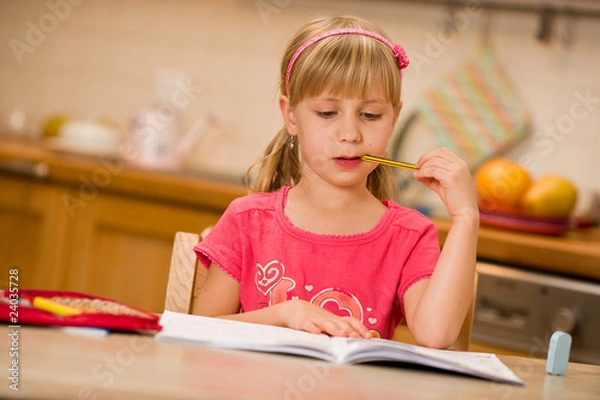 Fototapeta girl doing homework