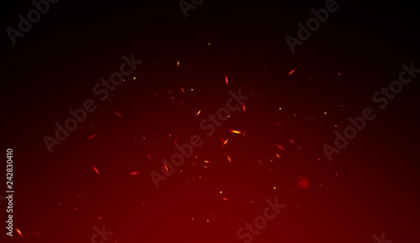 Fototapeta Fire effect dust debris isolated on background, motion powder spray burst in dark texture 