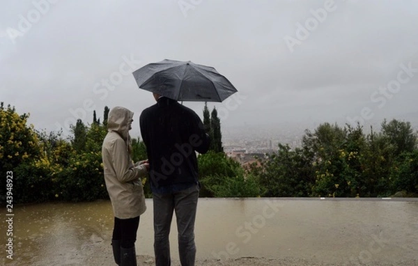 Fototapeta Couple on Rainy day with umbrella 