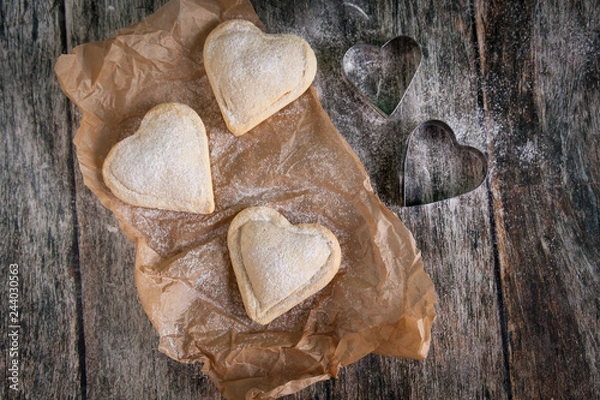 Fototapeta Homemade heart shape cookies with vanilla custard cream