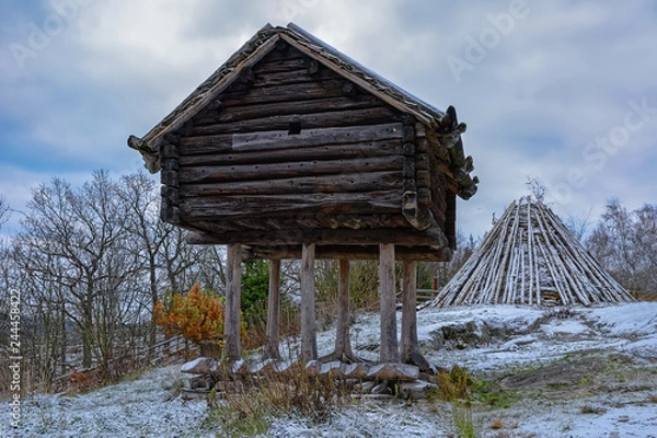 Fototapeta Winter view of preserved Sami Camp from the beginnings of the 20th century, used in Lappland. Skansen, Stockholm, Sweden.