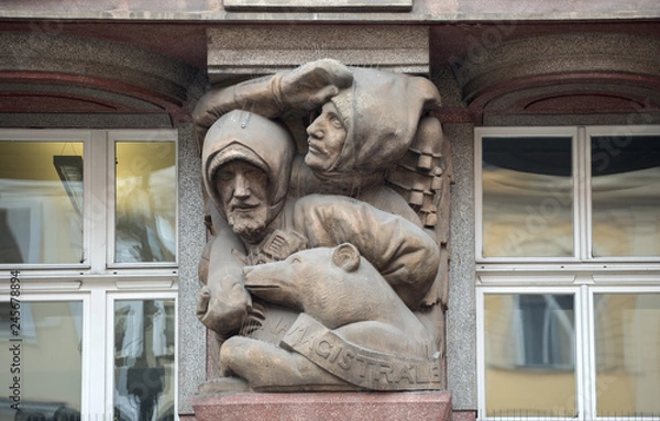 Fototapeta Facade  sculptures of old Rondocubism building in Prague, Czech Republic.