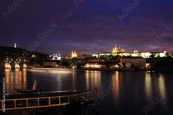 Fototapeta The night View on bright Prague with gothic Castle