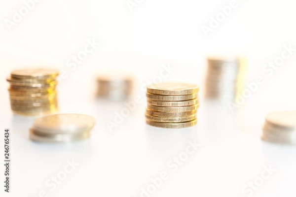 Fototapeta Stack of coins macro. Rows of coins for finance and banking concept. Economy trends background.