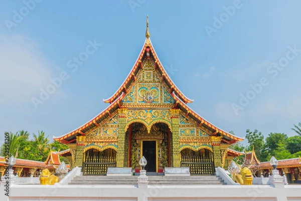 Obraz The sanctuary, Wat Wang Kham Temple, Khao Wong District, Kalasin Province, with the blue sky cloud.The public property in Thailand.