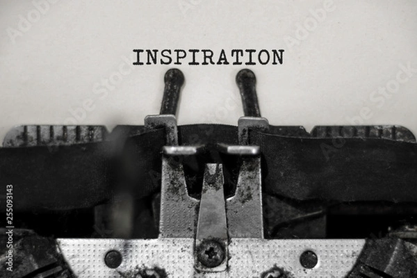 Fototapeta Inspiration word with black and white typewriter concept