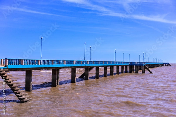 Fototapeta Long pier on the beach