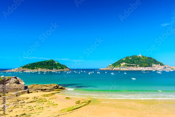 Fototapeta Beautiful La Concha beach with nobody at San Sebastian Donostia, Spain. Best european beach in sunny day