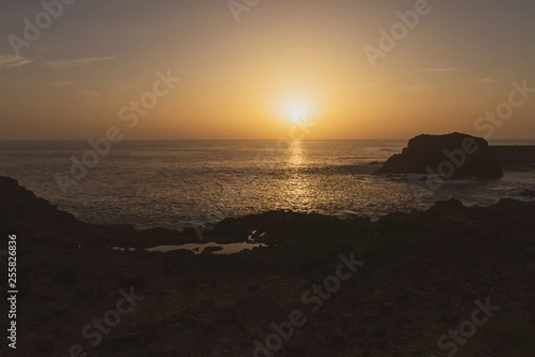 Fototapeta sunset over the atlantic ocean