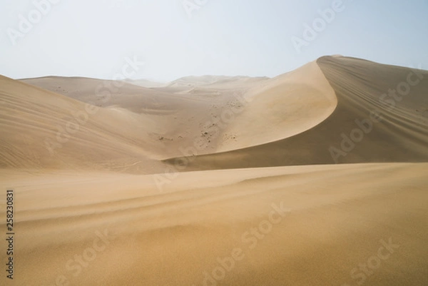 Fototapeta Sand dunes landscape and waves of sand in the Gobi Desert in China, Gobi Desert, China