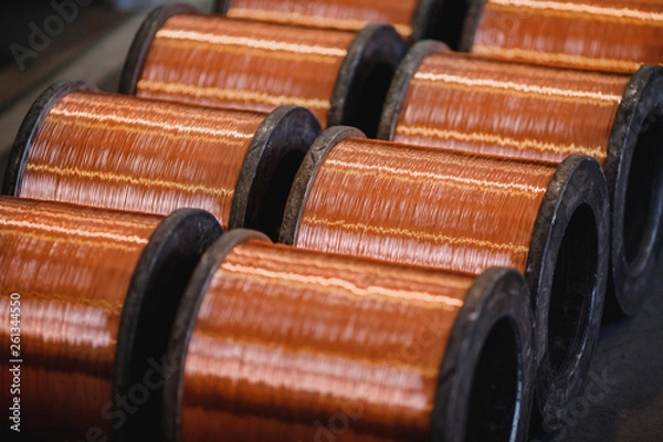 Fototapeta Production of copper wire, bronze cable in reels at factory