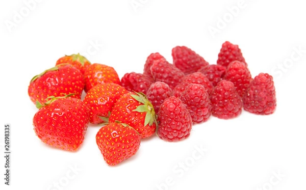 Fototapeta fresh raspberries and strawberries over white background