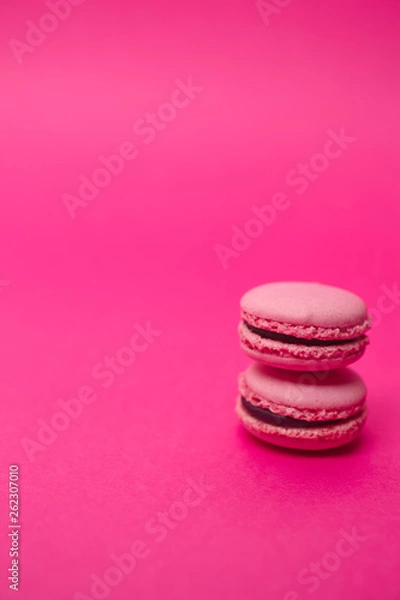 Fototapeta Two macarons on magenta background