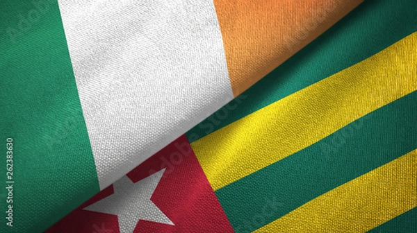 Fototapeta Ireland and Togo two flags textile cloth, fabric texture