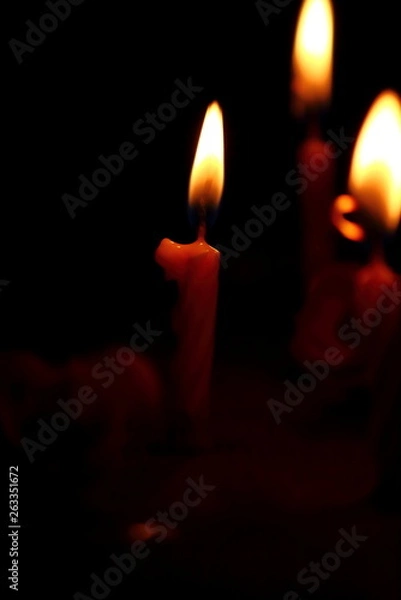 Fototapeta candles with candle light in the dark