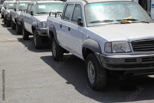 Fototapeta many cars waiting for shipment near port