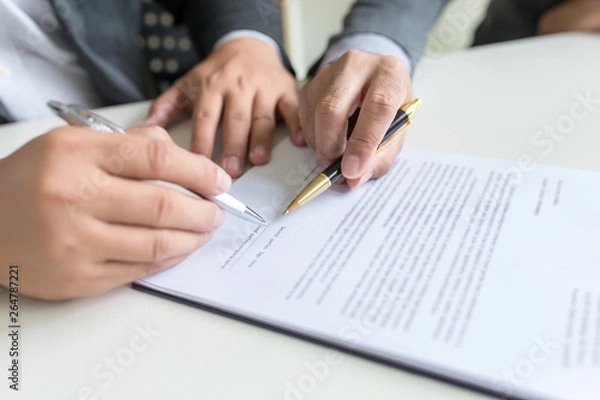 Fototapeta Business people, signing a contract, meeting together at a meeting.