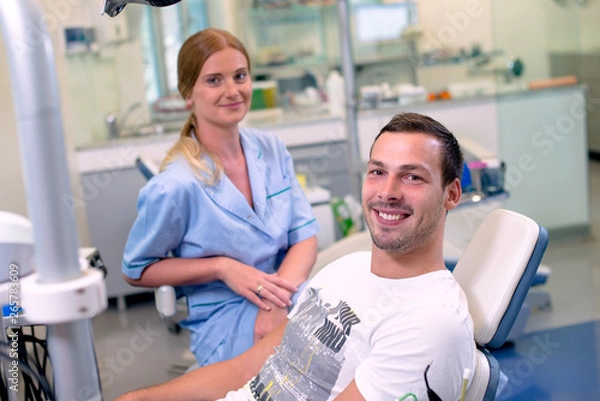 Fototapeta Young man patient and dentist.