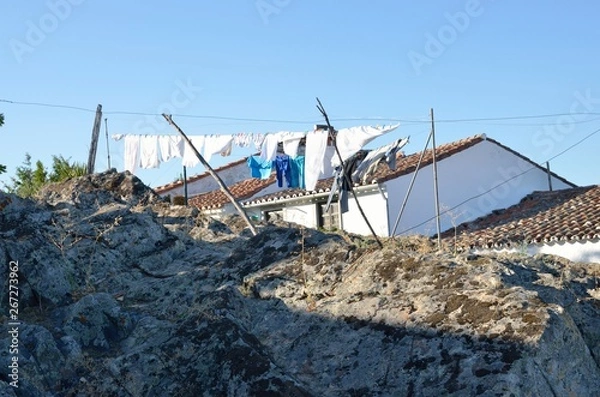 Fototapeta Clothes hanged up at exterior in Marvao, Portugal