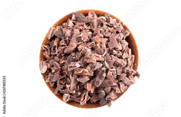 Fototapeta Bowl of Chocolate Nibs Isolated on a White Background