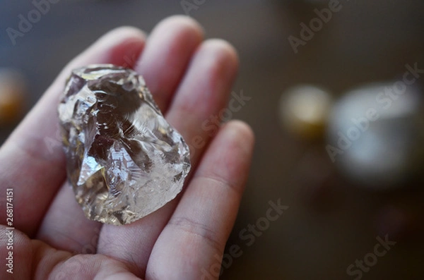 Fototapeta Dark Smokey Quartz. Premium quality crystal smoky Quartz, palm stone sized crystal. Textures of nice healing crystal. Witchy dark magic stone, witchcraft. Reiki chakra healing. 