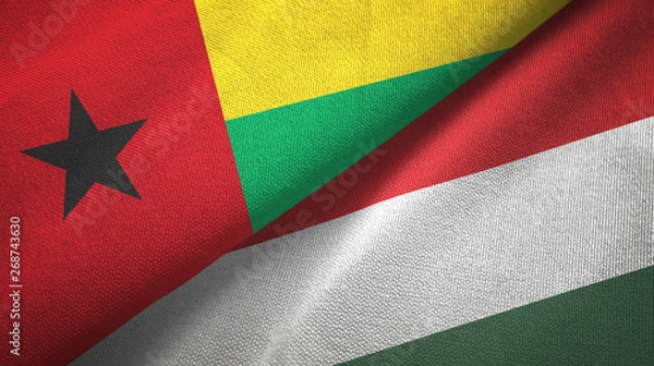 Fototapeta Guinea-Bissau and Hungary two flags textile cloth, fabric texture