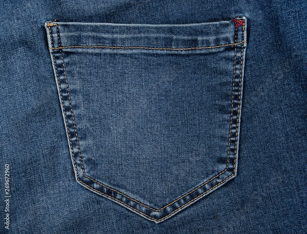 Fototapeta back pocket on blue jeans, full frame