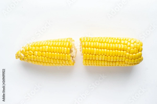 Fototapeta Close Up of raw corn on white background.