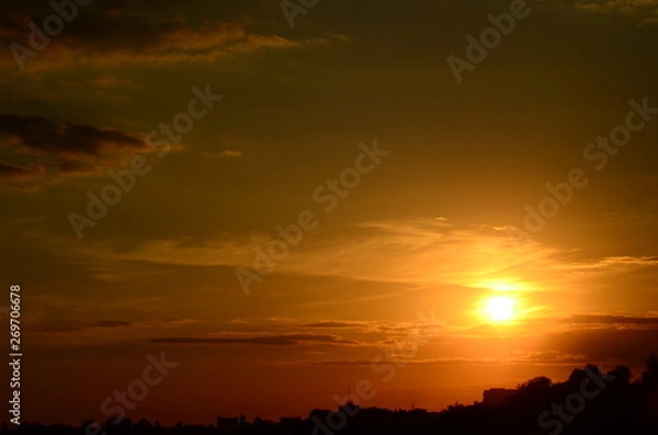 Fototapeta AERIAL: Flight over the wheat field in sunset