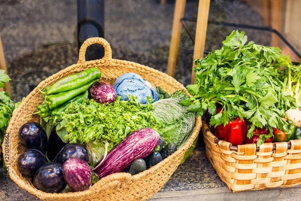 Fototapeta healthy vegetables in wicker basket for sale