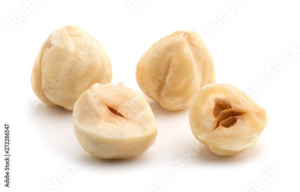 Fototapeta Hazelnuts isolated on the white background