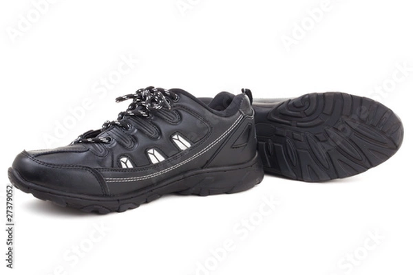 Fototapeta Black leather shoes on a white background